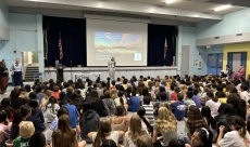Volunteer Lehman speaking at La Canada Elementary School discussing the history of NASA's Jet Propulsion Laboratory